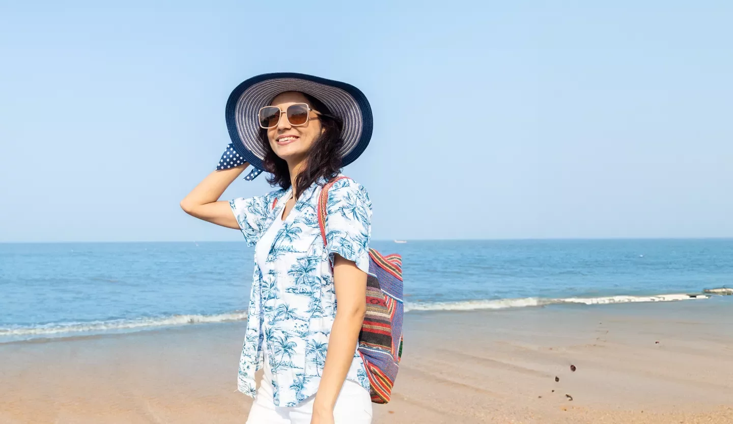 person wearing hat and sunglasses