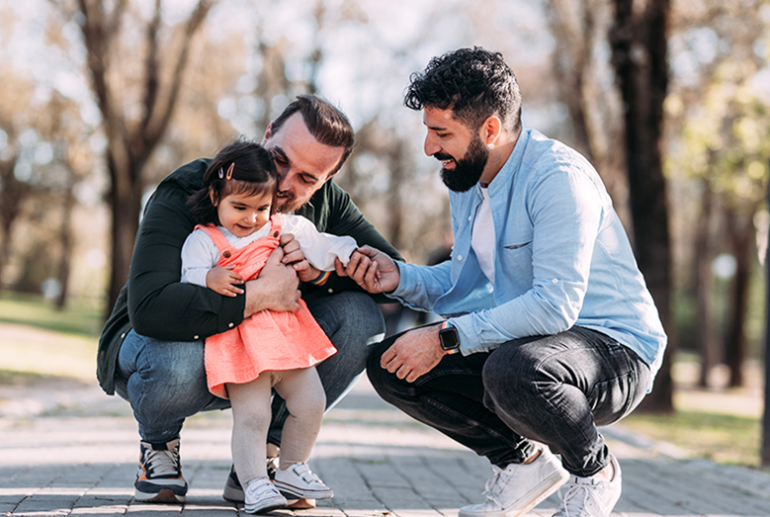 toddler with parents